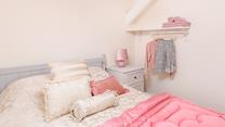 Wake up refreshed and ready for the day in bedroom 4.