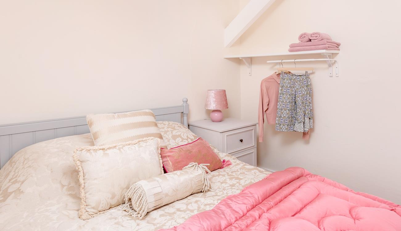 Wake up refreshed and ready for the day in bedroom 4.