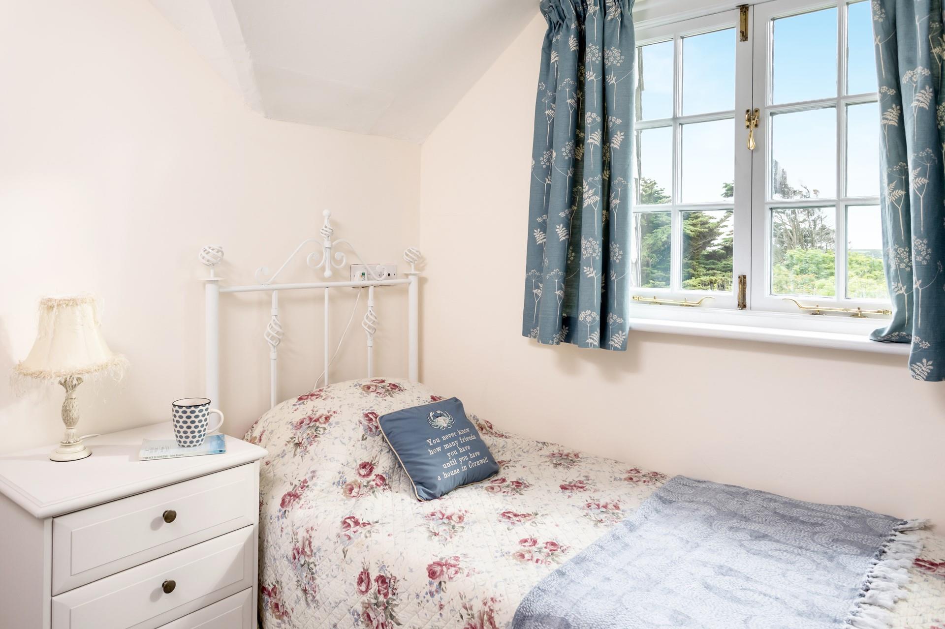 Bedroom 1 has a single bed and idyllic countryside views.