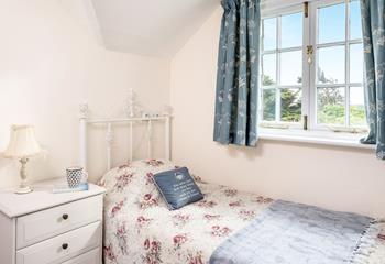 Bedroom 1 has a single bed and idyllic countryside views.