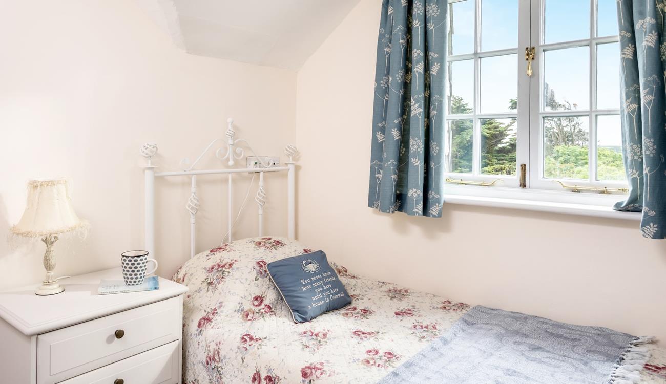 Bedroom 1 has a single bed and idyllic countryside views.