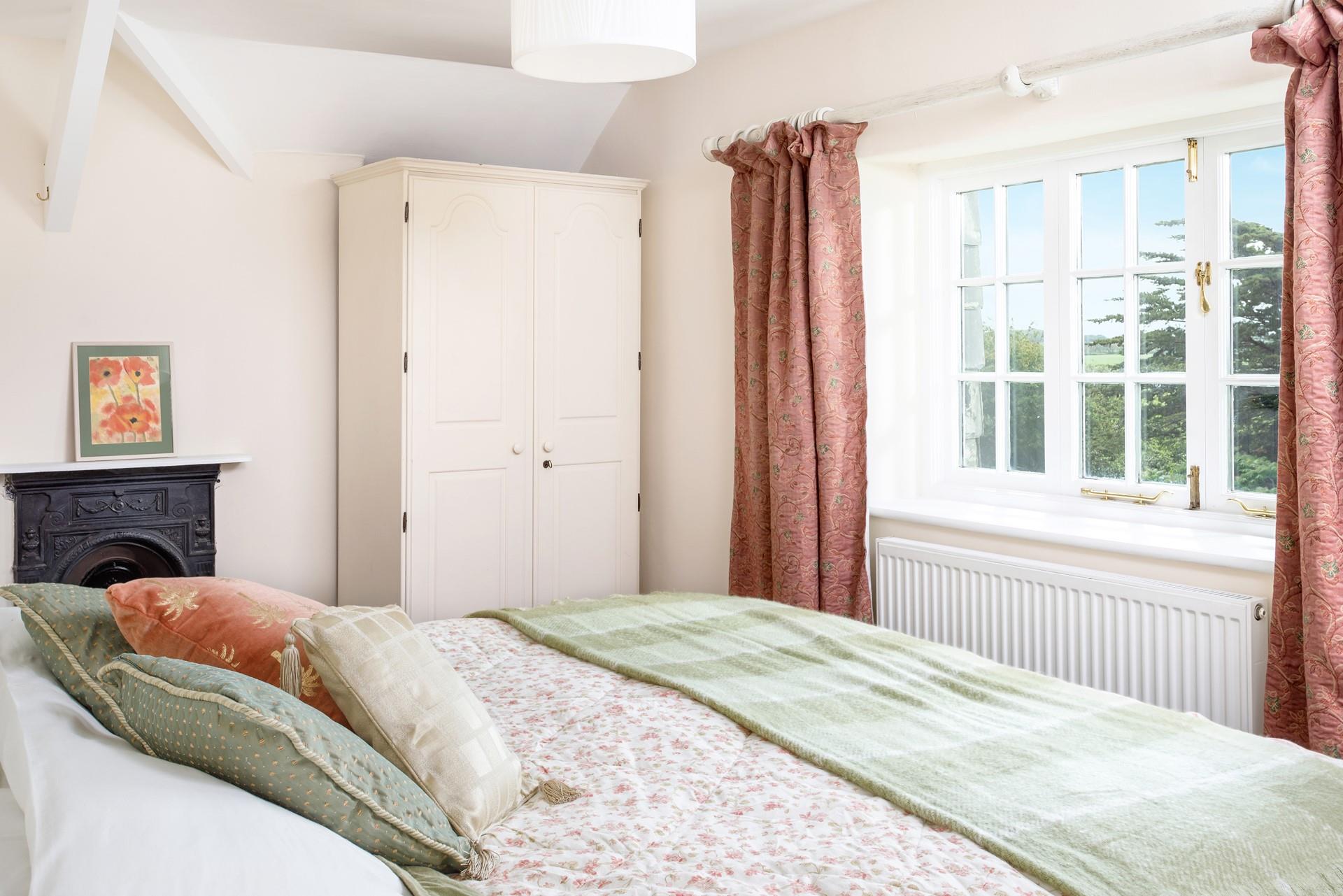 Bedroom 2 has a spacious super king size bed for a relaxing night's sleep.