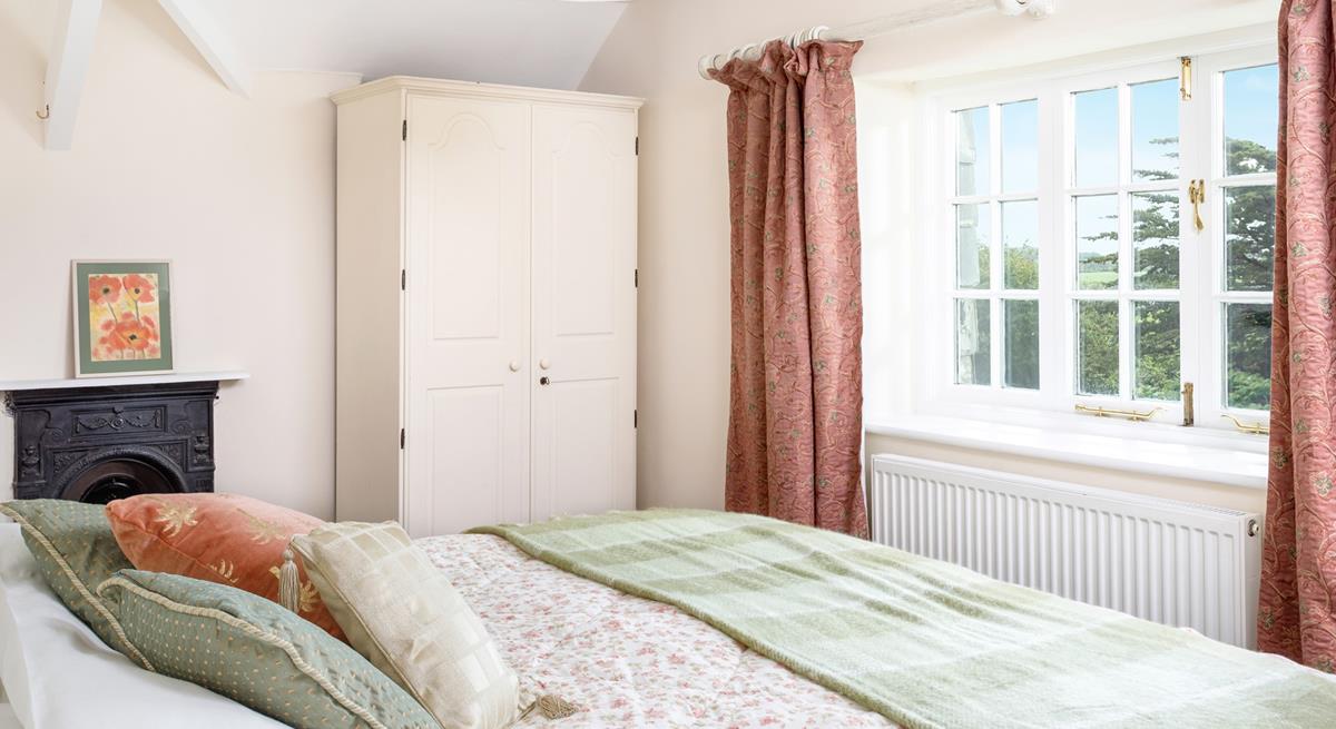 Bedroom 2 has a spacious super king size bed for a relaxing night's sleep.