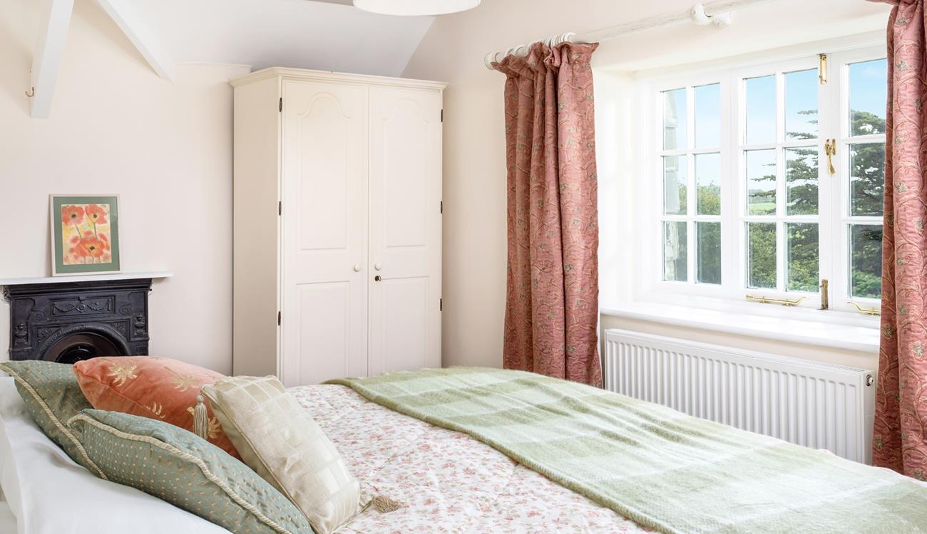 Bedroom 2 has a spacious super king size bed for a relaxing night's sleep.