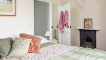 Wash off sandy toes and tuck into the soft sheets.