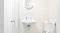 Get ready for the day in the en suite shower room.