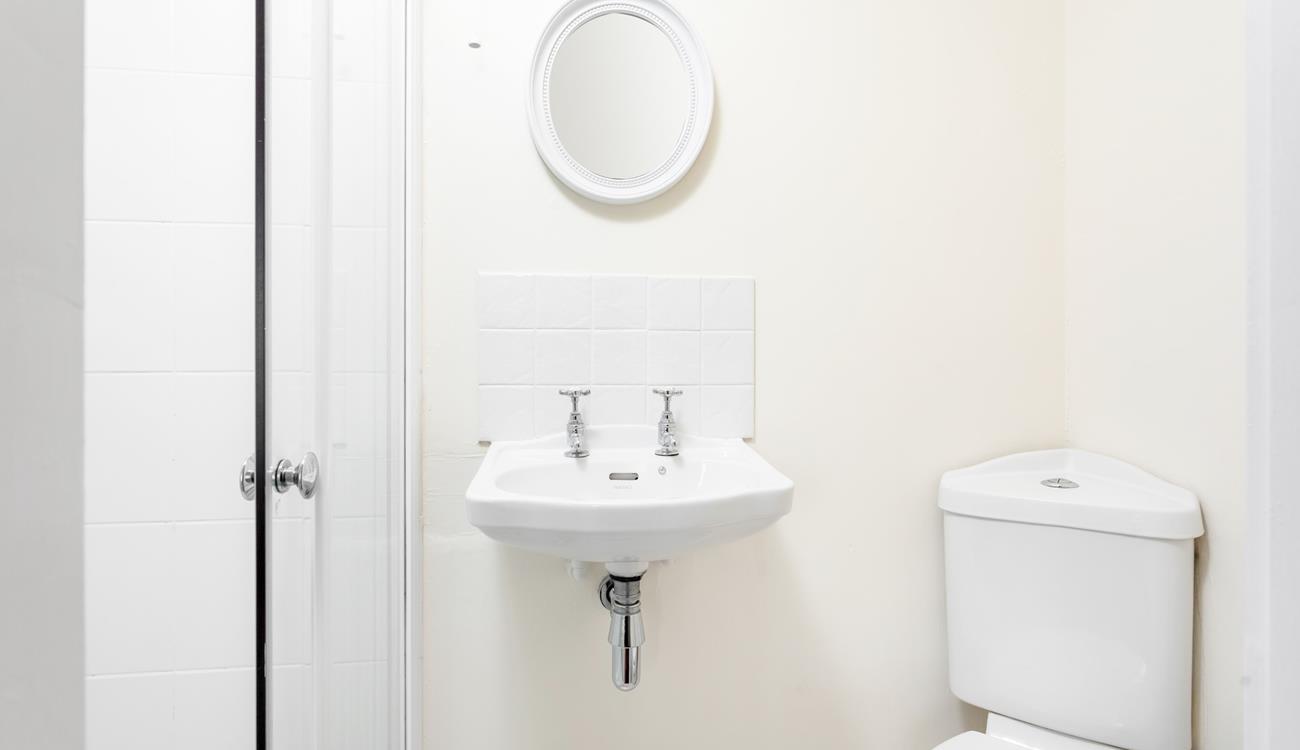 Get ready for the day in the en suite shower room.