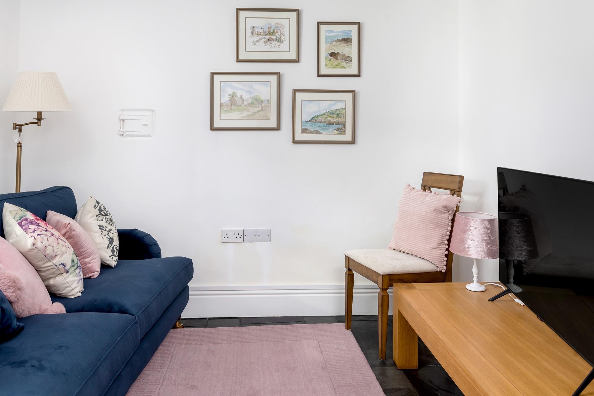 Sink into the sofa and enjoy a movie night, don't forget the snacks.