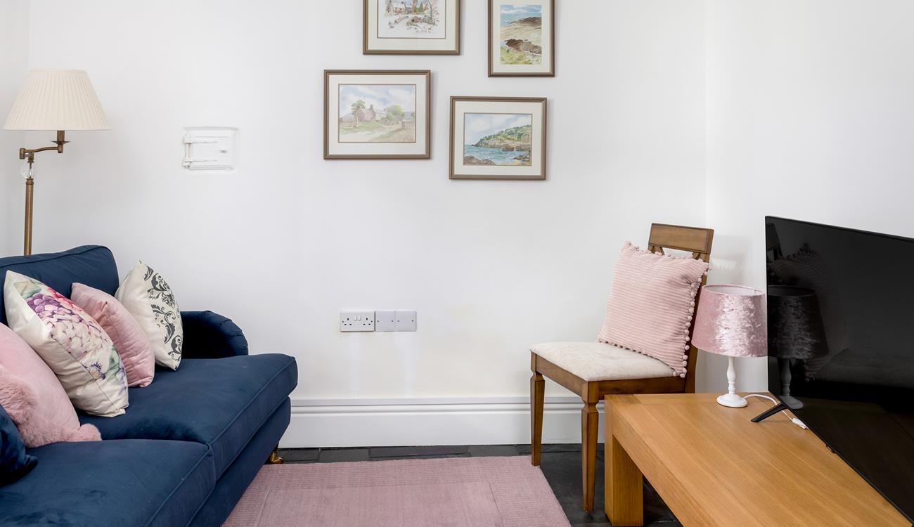 Sink into the sofa and enjoy a movie night, don't forget the snacks.