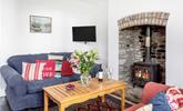 Snuggle up in front of the crackling woodburner in the evening after a day out. - Thumbnail Image