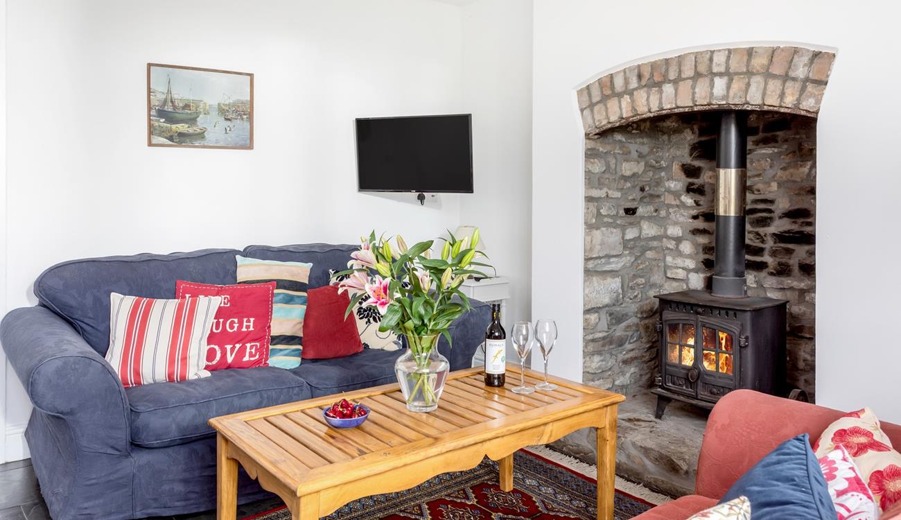 Snuggle up in front of the crackling woodburner in the evening after a day out.