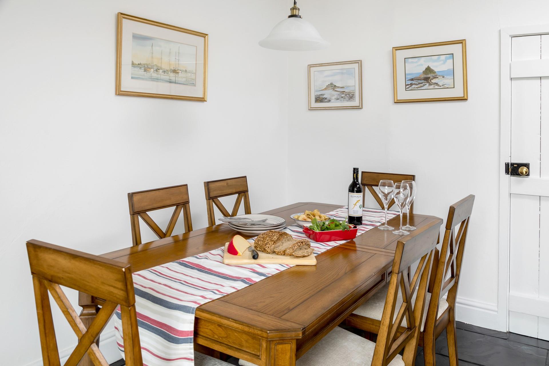 Sit around the dining table and tuck into local Cornish produce.