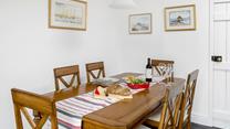 Sit around the dining table and tuck into local Cornish produce.