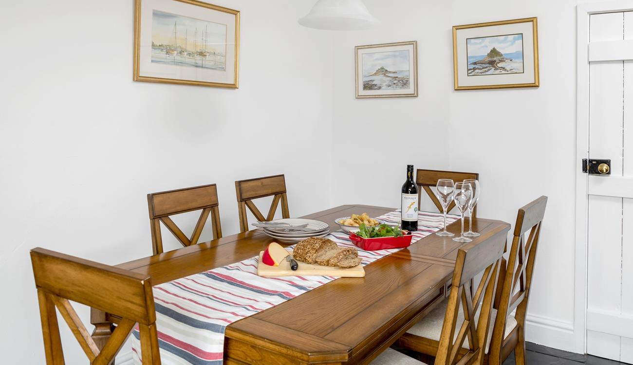 Sit around the dining table and tuck into local Cornish produce.