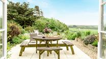 Enjoy the fresh air and countryside views in the garden in the afternoon sun.