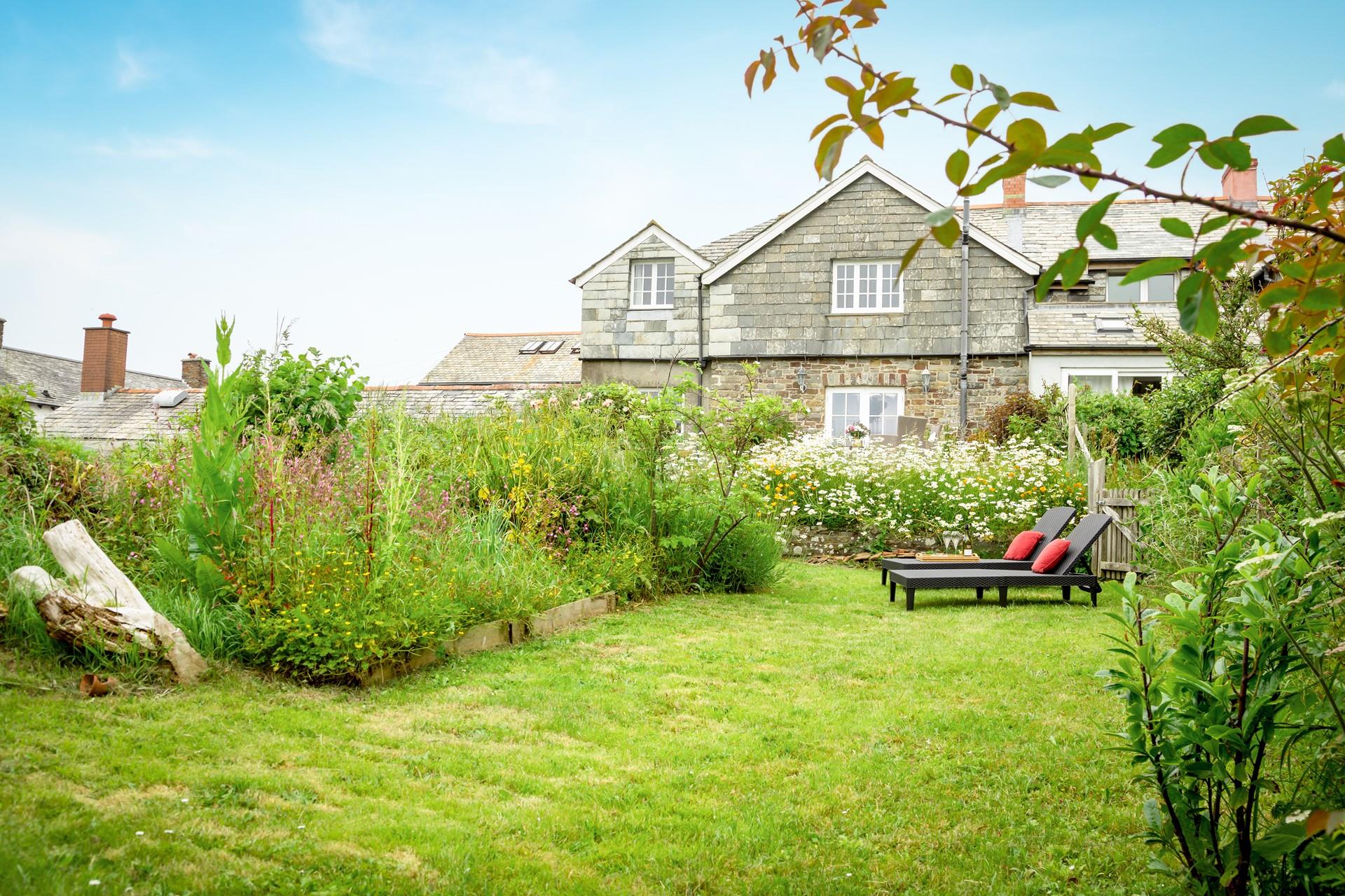 Relax on the sun loungers and enjoy the quiet and tranquil suntrap in the leafy garden.