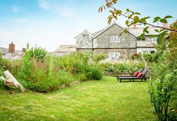 Relax on the sun loungers and enjoy the quiet and tranquil suntrap in the leafy garden.