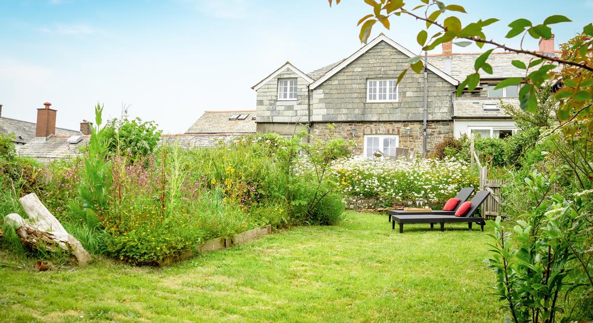 Relax on the sun loungers and enjoy the quiet and tranquil suntrap in the leafy garden.