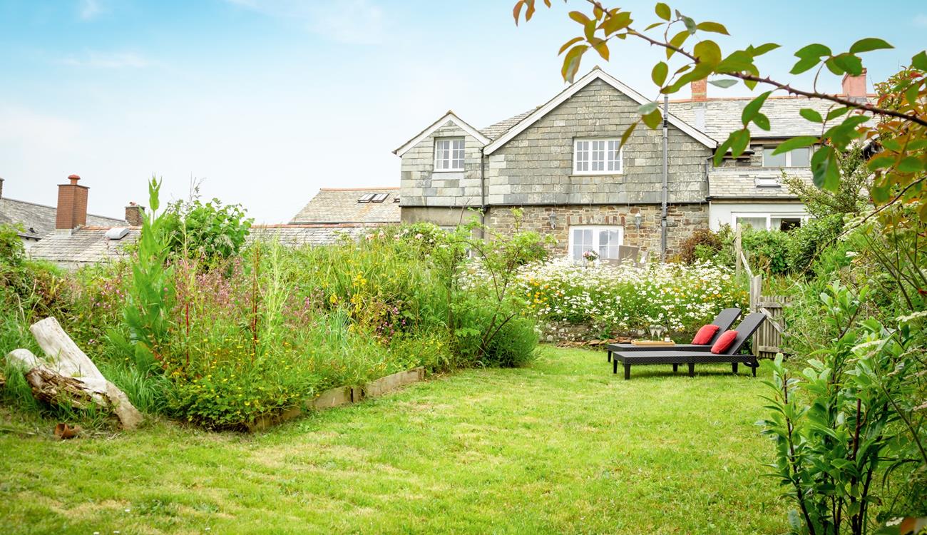 Relax on the sun loungers and enjoy the quiet and tranquil suntrap in the leafy garden.