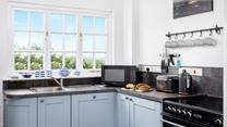 The view from the kitchen window is perfect to gaze out at whilst cooking up a storm.