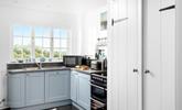 The kitchen is modern and fully equipped for rustling up delicious dinners and hearty cooked breakfasts. - Thumbnail Image
