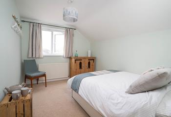 Bedroom 2 has a spacious double bed perfect for a dreamy night's sleep.