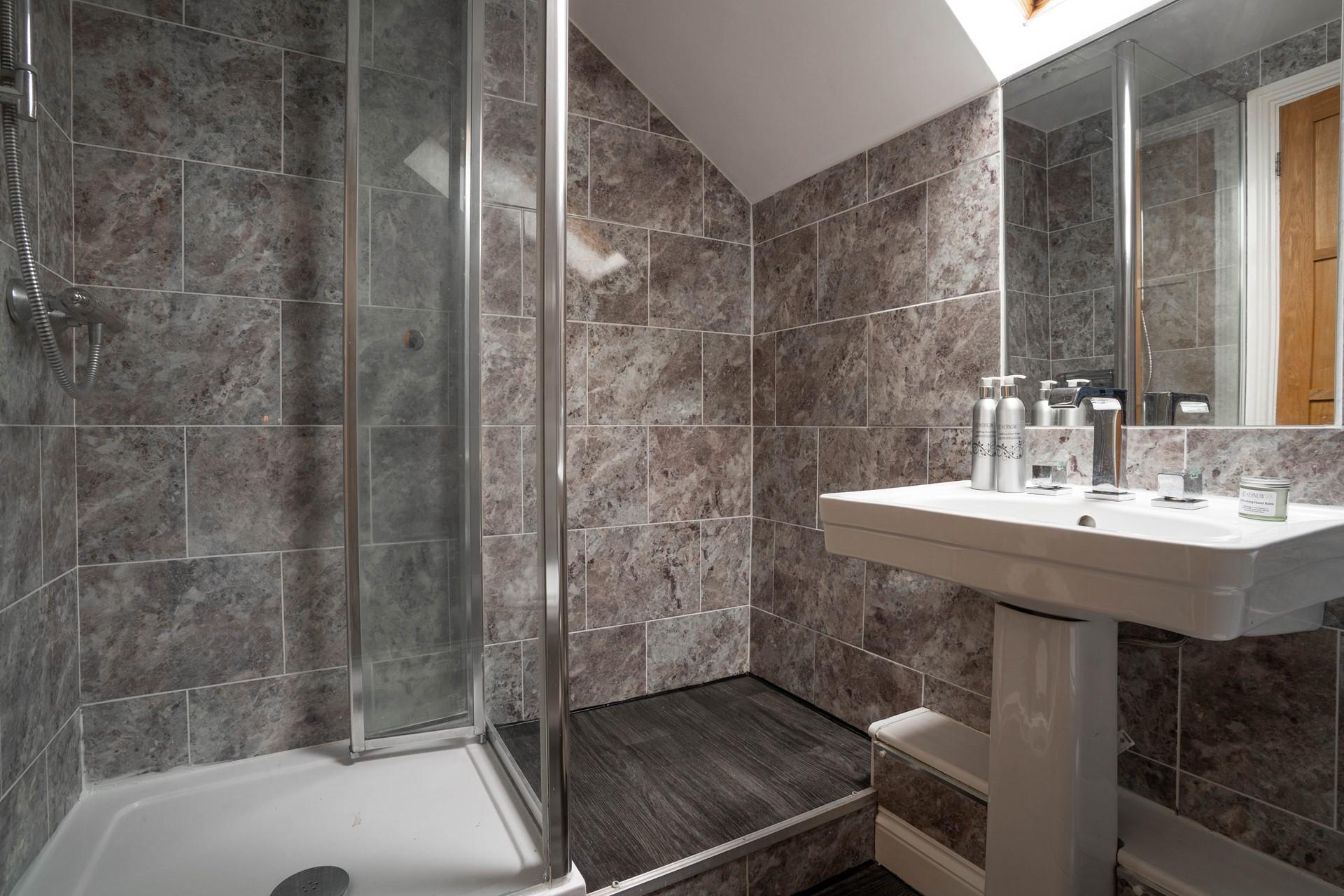 Wash salty hair and sandy toes after a memorable day on the beach.