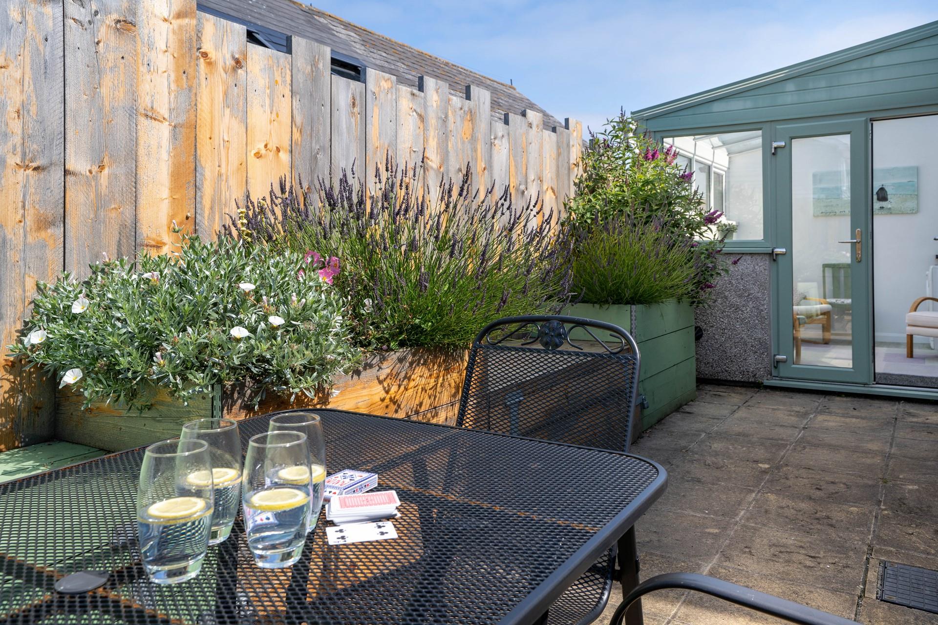 Sit outside in the evening sun with a G&T.