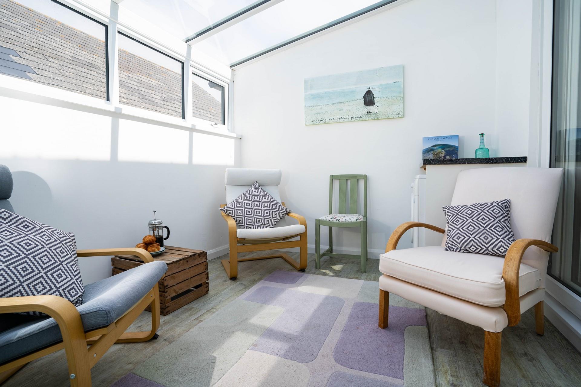 Grab your favourite book and enjoy a few moments of quiet in the conservatory.