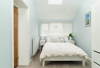 Bedroom 1 is located on the ground floor and provides a cosy night's sleep.