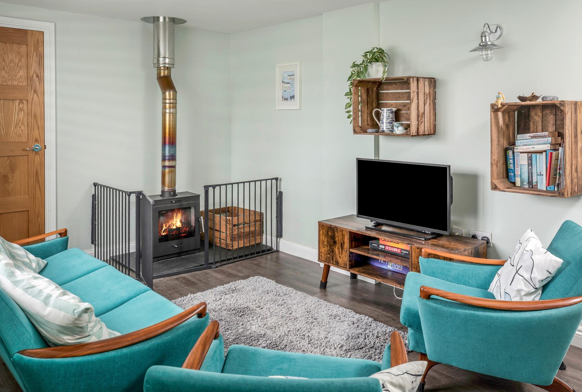 Relax in the comfortable sitting room in front of your favourite movie in the evening.