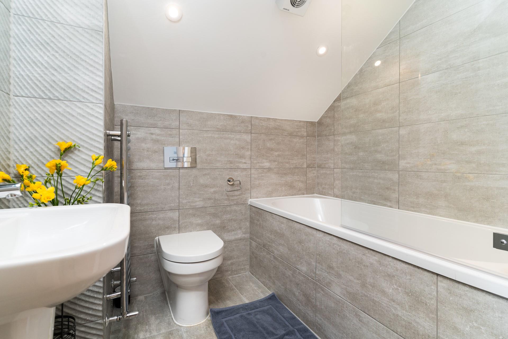 Run yourself a hot bubble bath and sink into the tub.