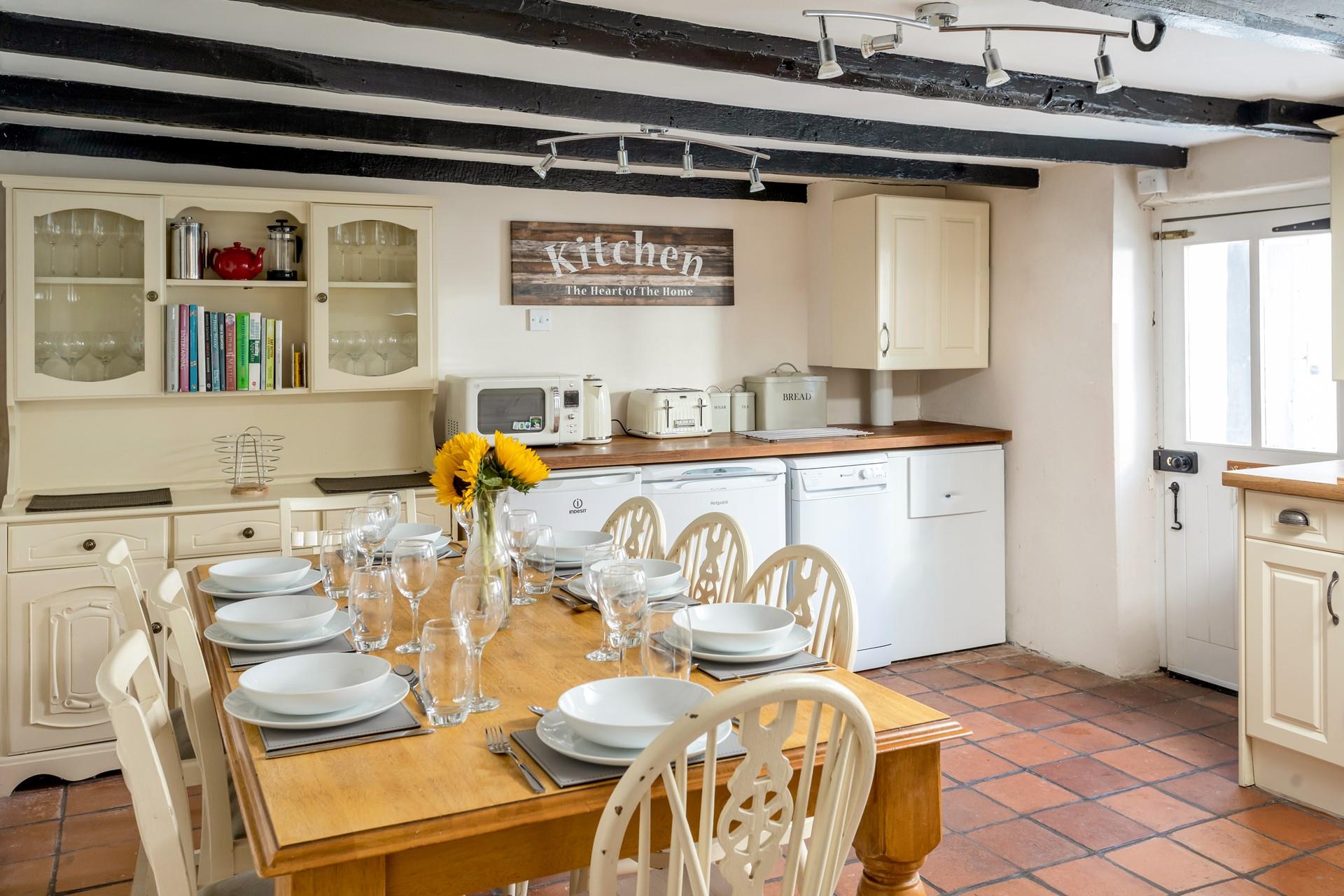 The kitchen has plenty of room for up to eight people to sit and enjoy a family meal together.
