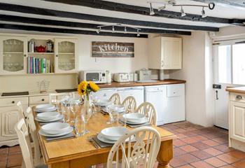 The kitchen has plenty of room for up to eight people to sit and enjoy a family meal together.