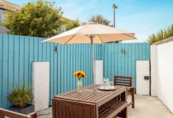 The rear terrace is a delightful suntrap on a summer's afternoon, for enjoying a BBQ with friends. 