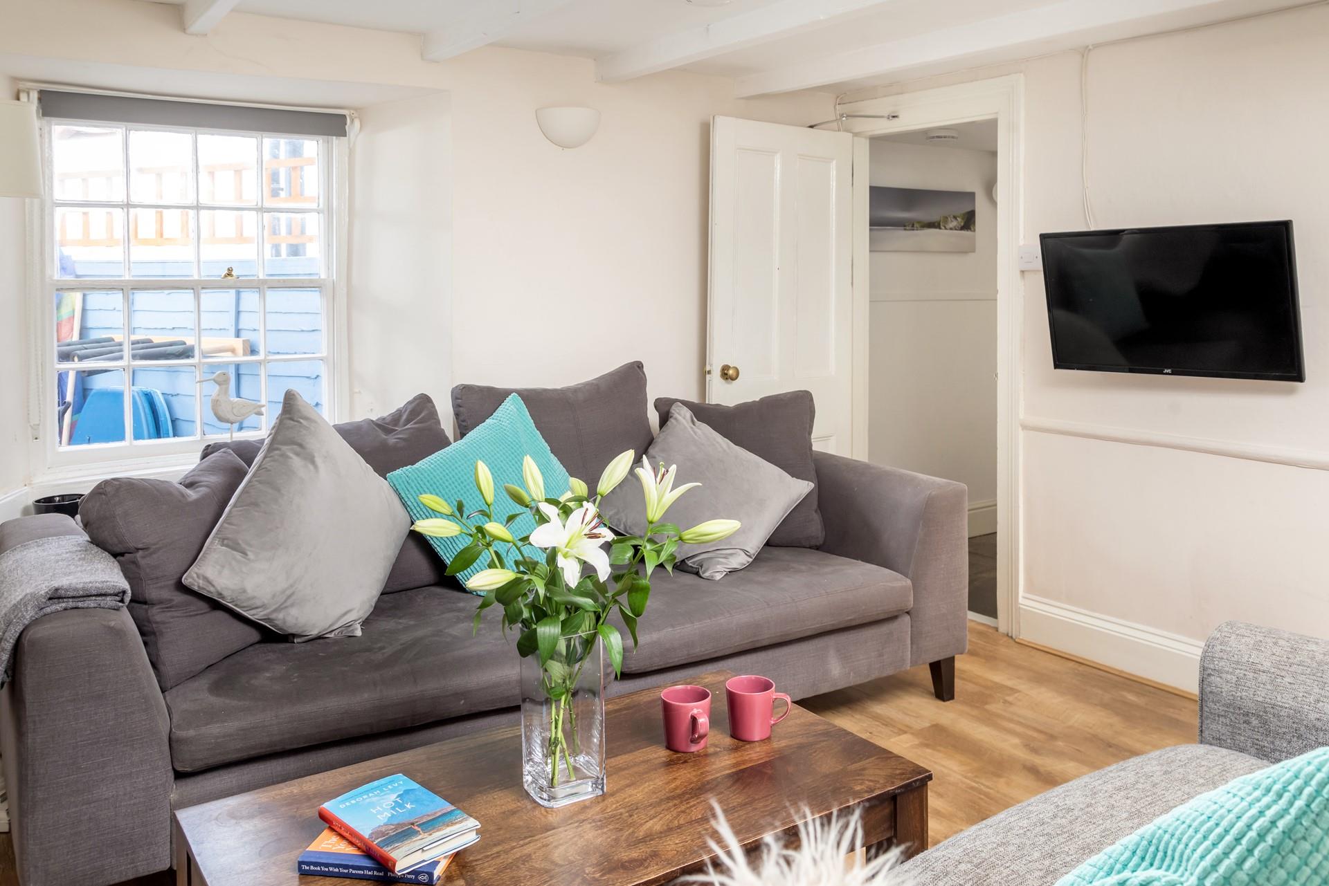 There is a second staircase from the living room that leads to bedrooms 2,3 and 4.