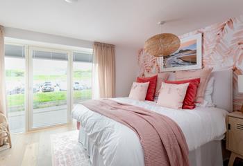 Bedroom 3 has a gorgeous pallet of pinks and corals, perfect for a relaxing lie in. 