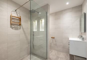 The en suite to bedroom 1 has a walk-in double shower and can be accessed via the ground floor hallway. 
