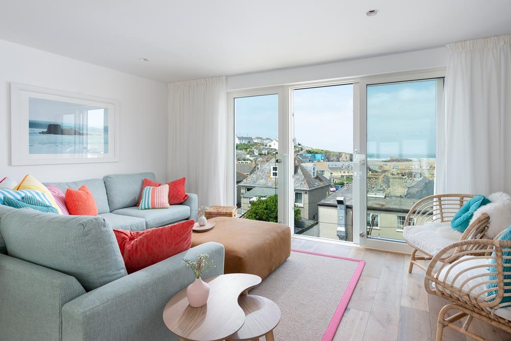 The living space is on the third floor, with open plan living and views of Perranporth beach.