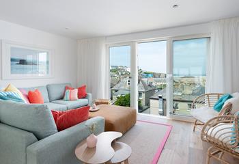 The living space is on the third floor, with open plan living and views of Perranporth beach.