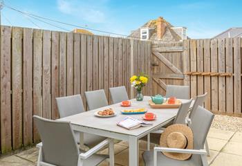 There is a gate to a shared path at the back of the house, so you can come straight into the garden from the beach. 