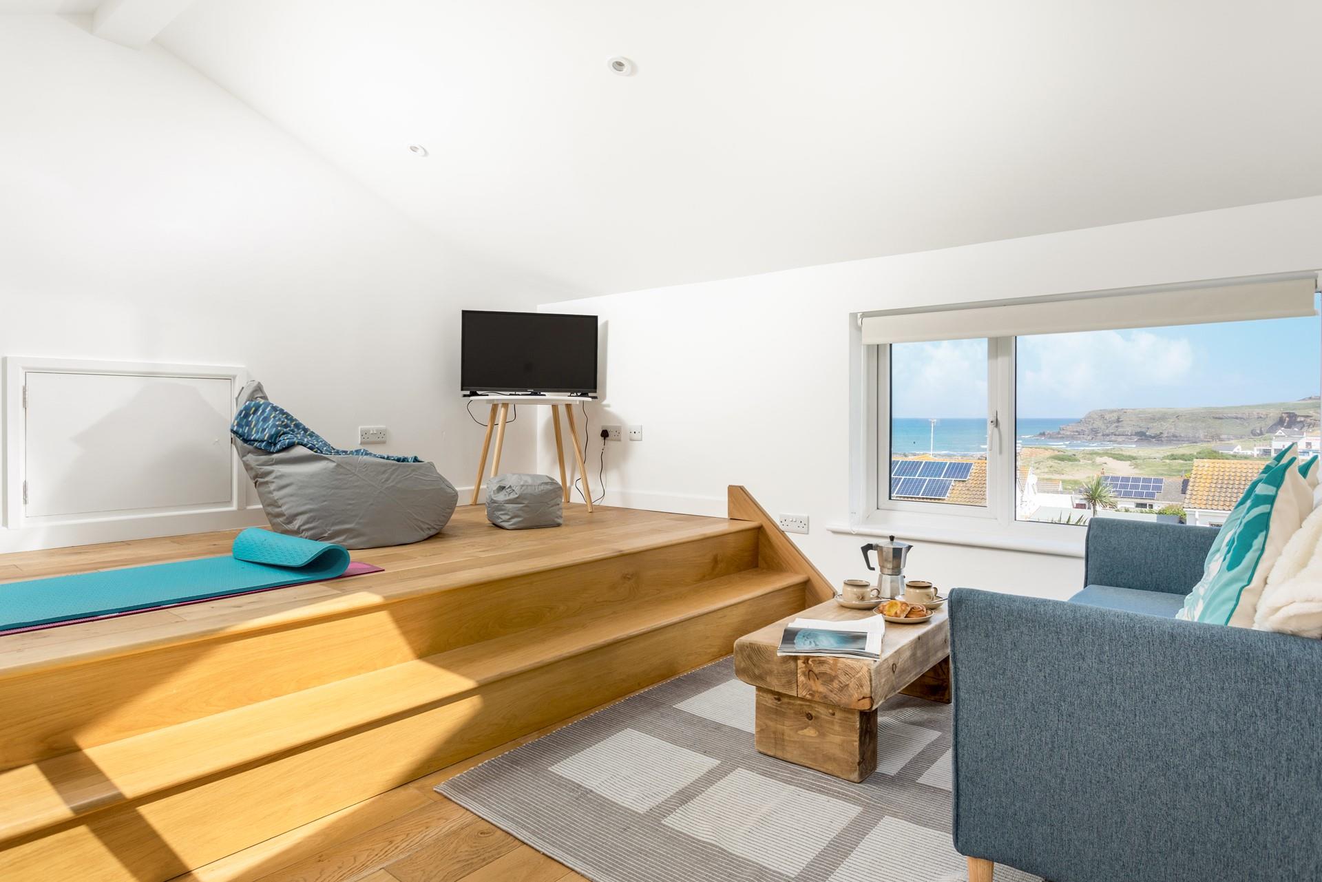 The snug area has far-reaching sea views and is the perfect coffee spot.