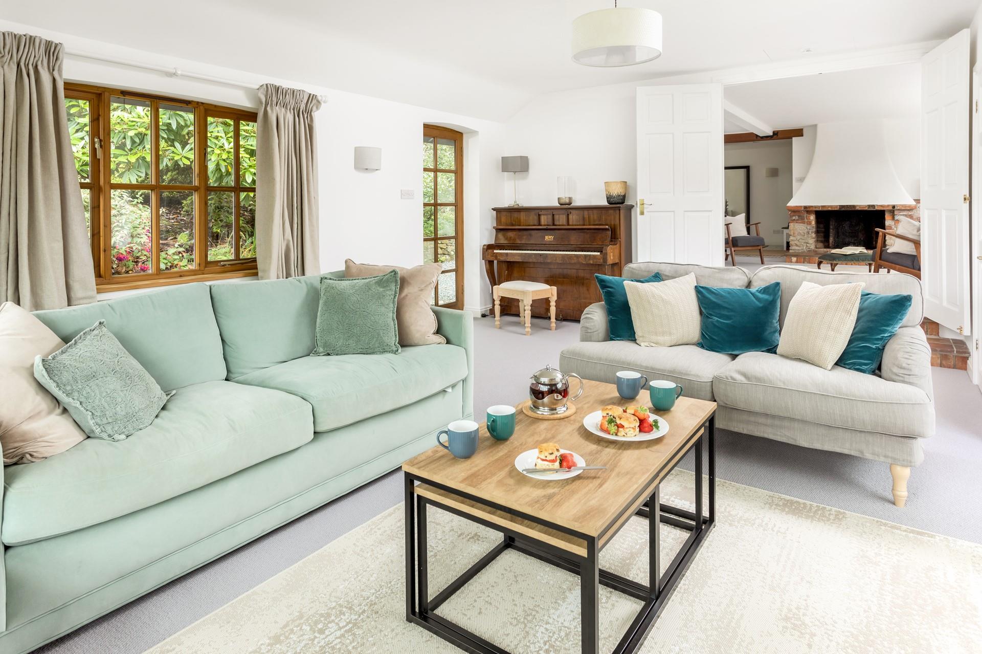 Relax on the sofa with a cream tea after a long walk exploring the countryside.