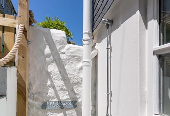 Wash off the salty wetsuits under the handy outdoor shower.