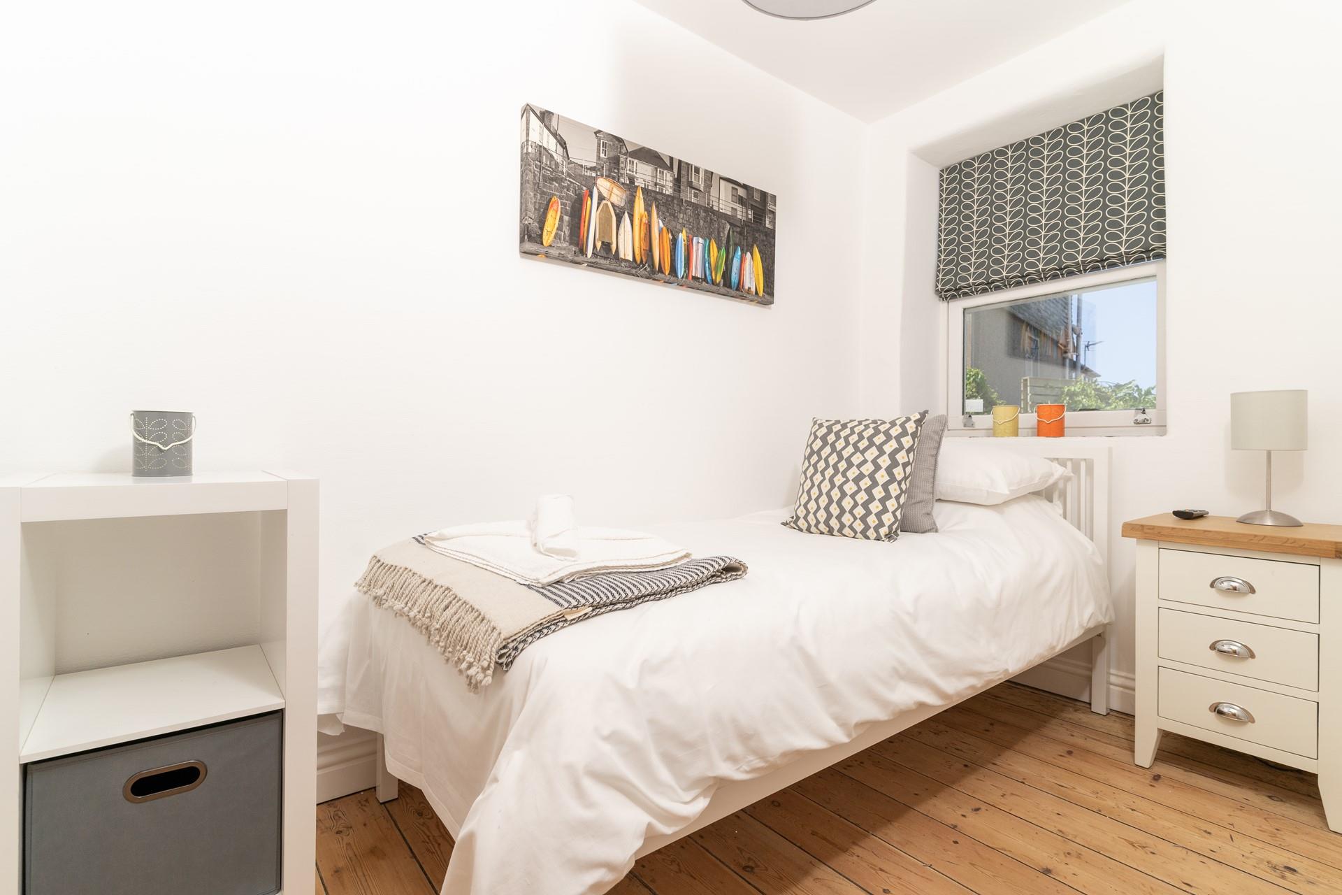 Tuck the little one into the single bed, they'll be exhausted after a day of playing on the beach.