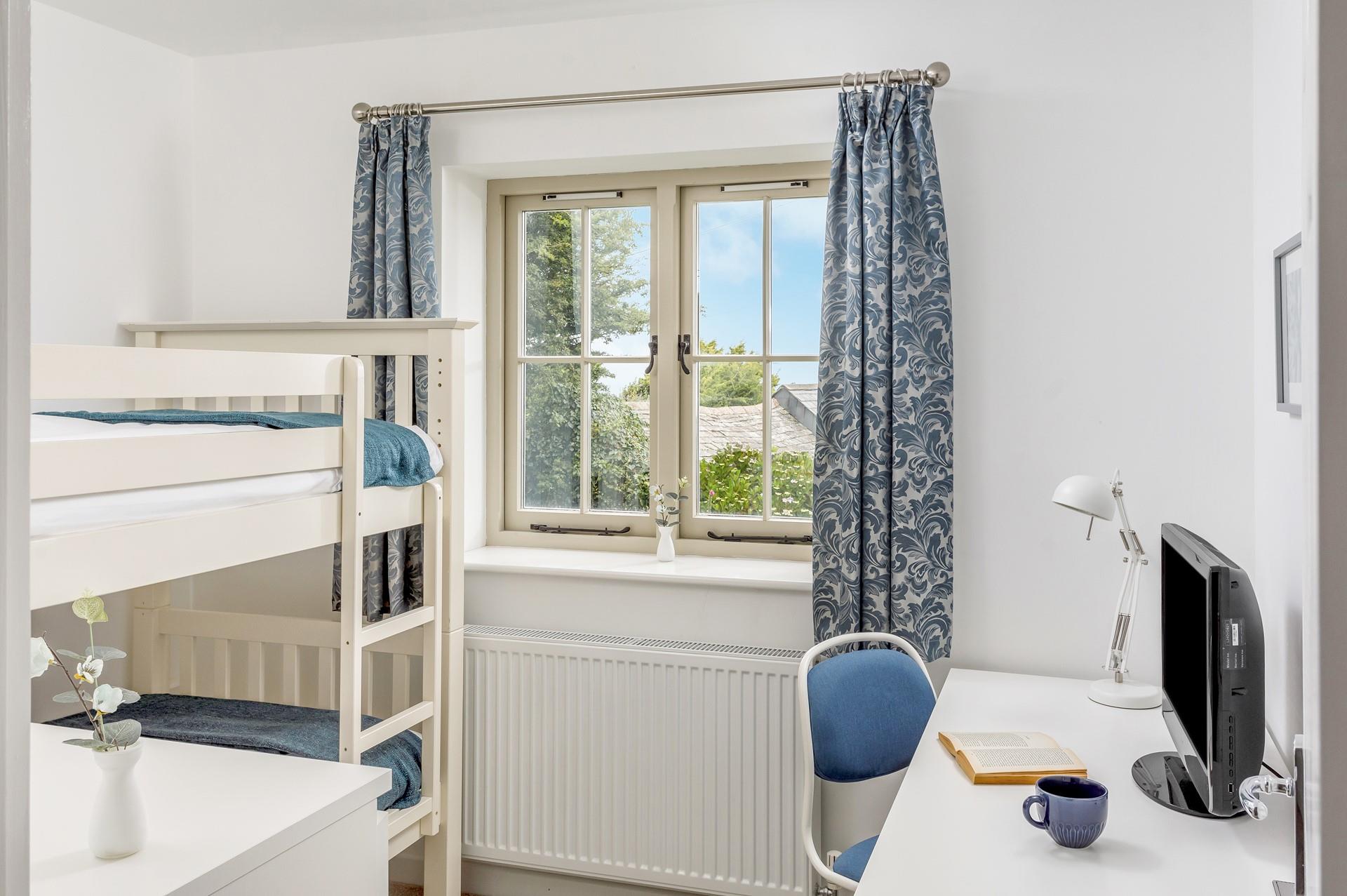 Kids will love a sleepover in the bunk beds.