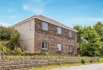 Made of traditional Cornish stone, Hendra Mowhay is set in a tranquil hamlet.