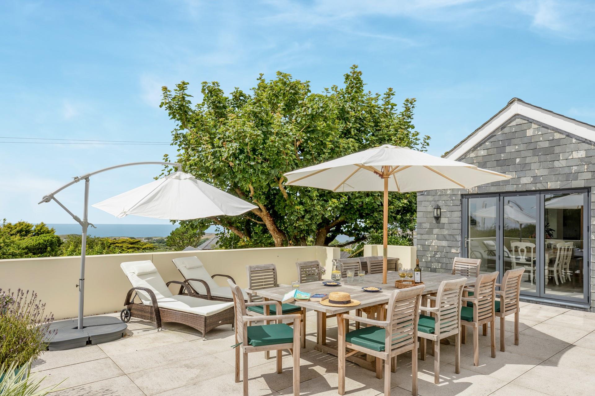Enjoy alfresco living a with view across the Cornish countryside and out to sea.