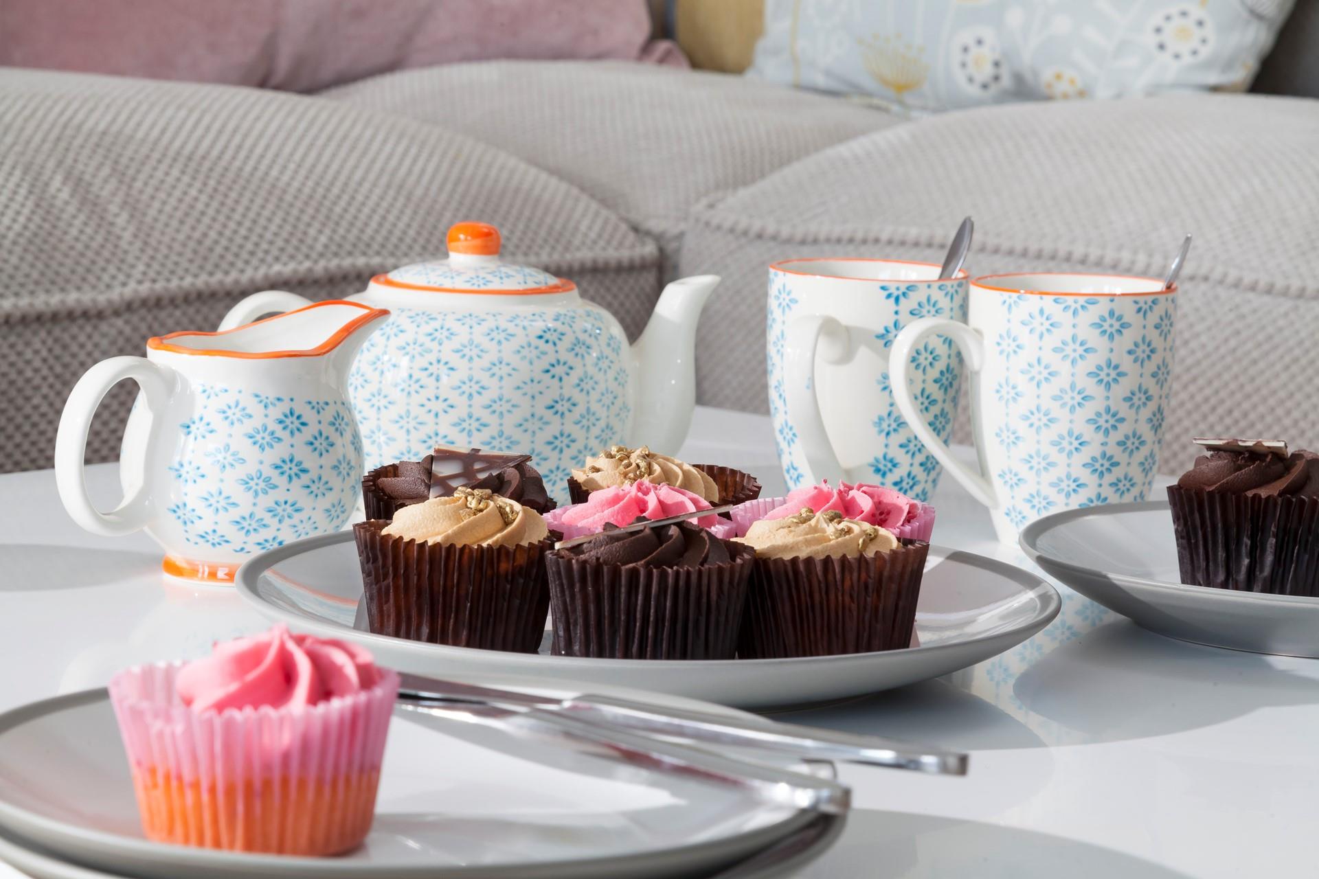 Tea and cake on this incredibly comfortable sofa with a sea view, can be enjoyed whatever the weather.