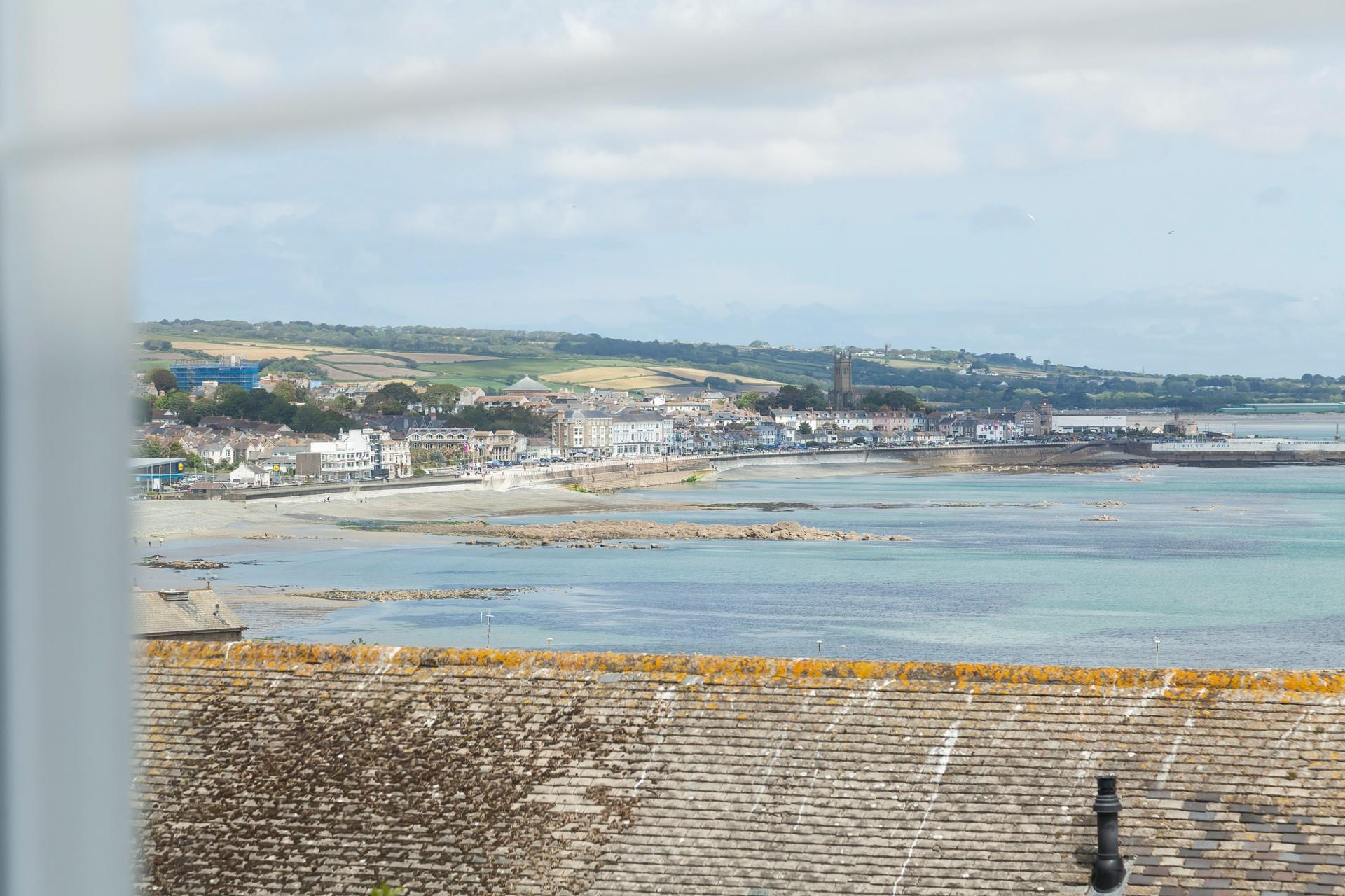 Breathtaking sea views over Penzance from the bedroom. 